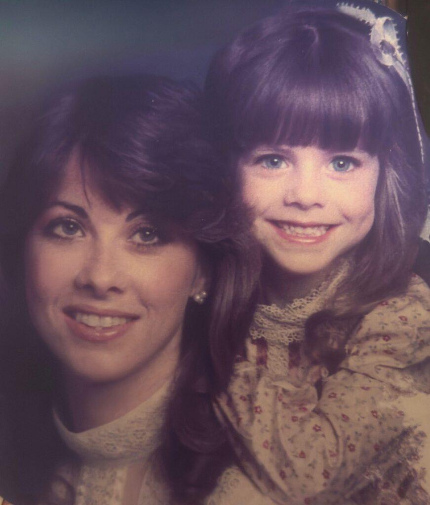 A photo of Christianne's mom and Christianne, age 5