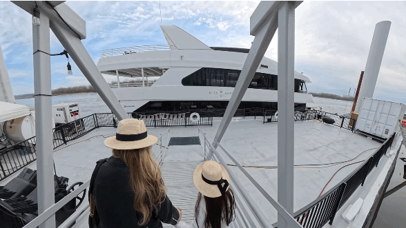 Christianne and Livia walking towards The Miss Augusta yacht. Image by Dan Sattel.
