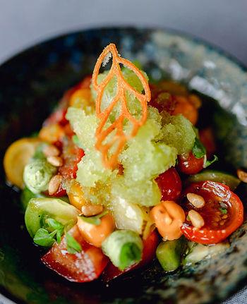 Vegetable salad with unique garnish.  Photo by Filipp Romanovski.