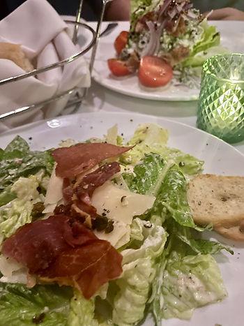 Caesar Salad with Crispy Prosciutto and Fried Capers and a Classic Wedge Salad
