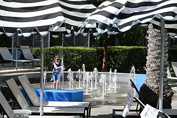 Livi enjoying the splash pad at Oasis Pool at The Viv Hotel, Anaheim.  Image by Dan Sattel