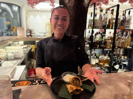 The incredibly talented Chef Sol Soto with her delicious beef empanadas.  Image by Christianne Klein. 