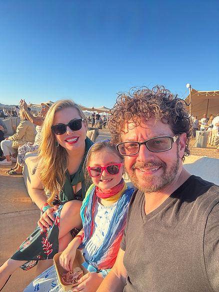 On our couch in The Haven at Rise Festival 2025 in the middle of the Mojave Desert.  Image by Dan Sattel.  