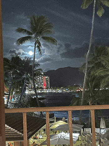 Supermoon from table on beach in Hawaii
