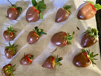 Our 7-year-old daughter helped dip this tray of strawberries in chocolate (they were gone within minutes :).  Image by Christianne Klein