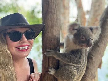 Christianne Klein with a koala at Billabong Sanctuary in Townsville, Australia.