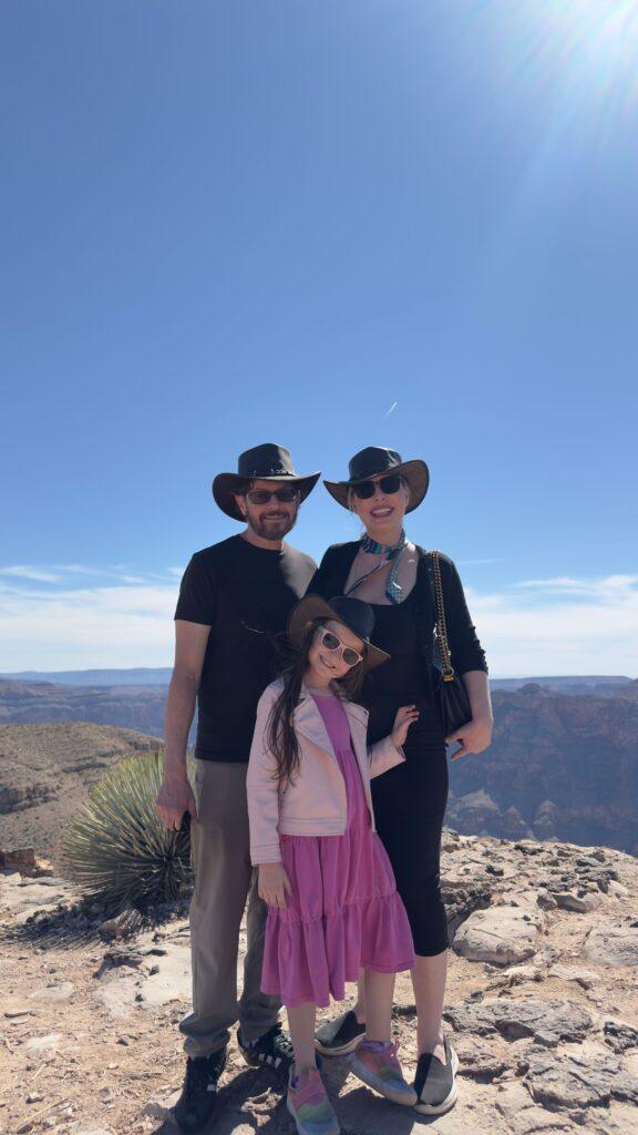 Christianne, Dan, and Livia at Grand Canyon West. Image by Valarina Jose.
