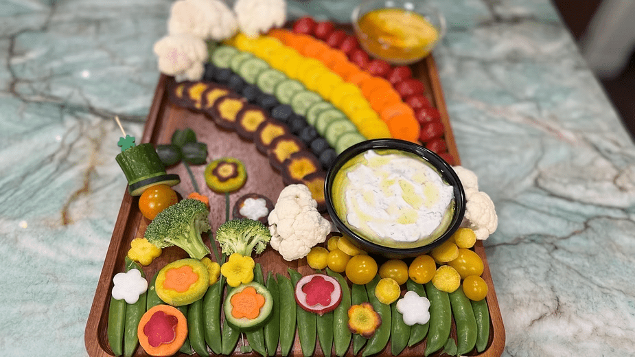 Christianne's St. Patrick’s Day veggie and fruit board with Golden Hummus, Greek Yogurt Dill Dip with Laconiko High Polyphenol Olive Oil. Image by Christianne Klein