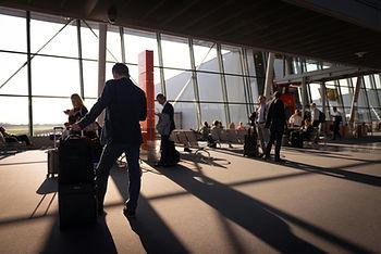 people in airport waiting